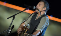 Bruce Springsteen plays harmonica and guitar during his set for The Concert for Valor in Washington, D.C. Nov. 11, 2014. DoD News photo by EJ Hersom