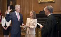 On April 10, 2017, Chief Justice John G. Roberts, Jr., administered the Constitutional Oath to the Honorable Neil M. Gorsuch in a private ceremony attended by the Justices of the Supreme Court and members of the Gorsuch family. The oath was administered in the Justices’ Conference Room at the Supreme Court Building. Chief Justice John G. Roberts, Jr., administers the Constitutional Oath to Judge Neil M. Gorsuch in the Justices' Conference Room, Supreme Court Building.  Mrs. Louise Gorsuch holds the Bible.
