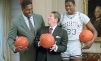 11/12/1984 President Reagan Patrick Ewing and John Thompson during a photo Op for the cover of Sports Illustrated in the Map Room