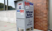 FILE PHOTO: A SafeVote official ballot drop box for mail-in ballots is seen outside a polling site at the Milwaukee Public Library’s Washington Park location in Milwaukee, on the first day of in-person voting in Wisconsin, U.S., October 20, 2020. REUTERS/Bing Guan/File Photo